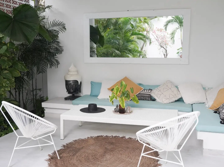 Villa Muse Living Area with sofa and chairs